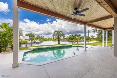 Luxury Waterfront Key West-Style Retreat on nearly 1/2 an acre on Sabal Trace Golf and Country Club in Florida - for sale on GolfHomes.com, golf home, golf lot