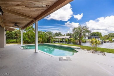 Luxury Waterfront Key West-Style Retreat on nearly 1/2 an acre on Sabal Trace Golf and Country Club in Florida - for sale on GolfHomes.com, golf home, golf lot