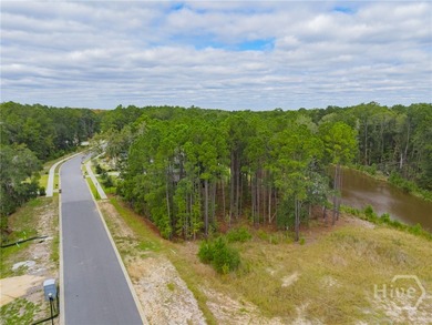 Build your custom dream home on this 0.44 acre lagoon front lot on Savannah Quarters Country Club in Georgia - for sale on GolfHomes.com, golf home, golf lot