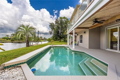 Luxury Waterfront Key West-Style Retreat on nearly 1/2 an acre on Sabal Trace Golf and Country Club in Florida - for sale on GolfHomes.com, golf home, golf lot