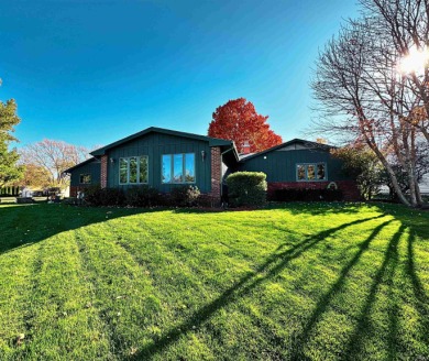 Nestled on a spacious lot and a half on the Tippecanoe Country on Tippecanoe Country Club in Indiana - for sale on GolfHomes.com, golf home, golf lot