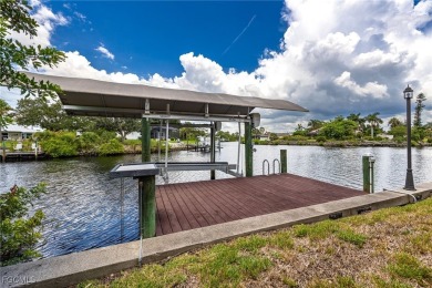 Luxury Waterfront Key West-Style Retreat on nearly 1/2 an acre on Sabal Trace Golf and Country Club in Florida - for sale on GolfHomes.com, golf home, golf lot