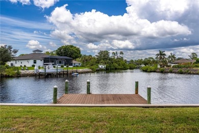 Luxury Waterfront Key West-Style Retreat on nearly 1/2 an acre on Sabal Trace Golf and Country Club in Florida - for sale on GolfHomes.com, golf home, golf lot