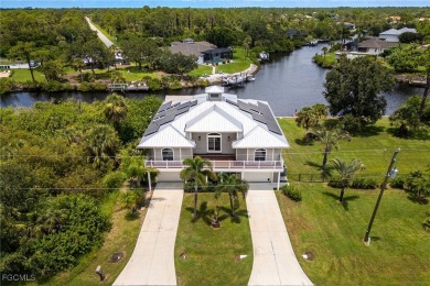 Luxury Waterfront Key West-Style Retreat on nearly 1/2 an acre on Sabal Trace Golf and Country Club in Florida - for sale on GolfHomes.com, golf home, golf lot