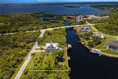 Luxury Waterfront Key West-Style Retreat on nearly 1/2 an acre on Sabal Trace Golf and Country Club in Florida - for sale on GolfHomes.com, golf home, golf lot