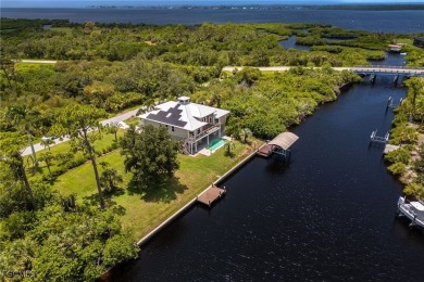 Luxury Waterfront Key West-Style Retreat on nearly 1/2 an acre on Sabal Trace Golf and Country Club in Florida - for sale on GolfHomes.com, golf home, golf lot