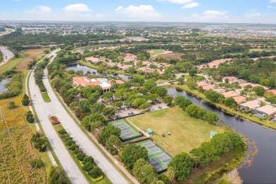 Beautifully appointed 3-bedroom, 3-bath home in the exclusive on The Legacy Golf and Tennis Club in Florida - for sale on GolfHomes.com, golf home, golf lot