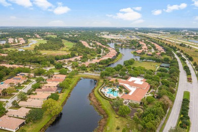 Beautifully appointed 3-bedroom, 3-bath home in the exclusive on The Legacy Golf and Tennis Club in Florida - for sale on GolfHomes.com, golf home, golf lot
