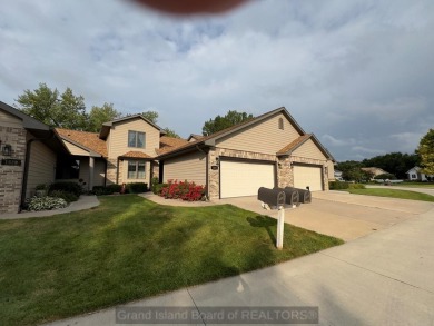 Beautiful 1 1/2 story condo with Riverside Golf Course views on Riverside Country Club in Nebraska - for sale on GolfHomes.com, golf home, golf lot