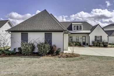 Experience resort style living in this beautifully appointed on Lake Caroline Golf Club in Mississippi - for sale on GolfHomes.com, golf home, golf lot