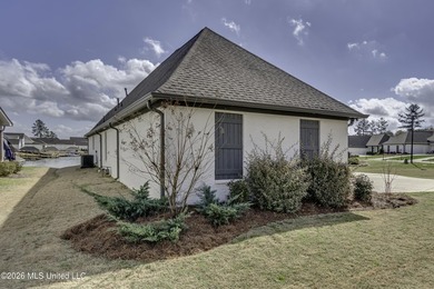 Experience resort style living in this beautifully appointed on Lake Caroline Golf Club in Mississippi - for sale on GolfHomes.com, golf home, golf lot