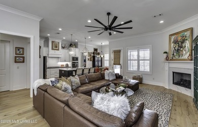 Experience resort style living in this beautifully appointed on Lake Caroline Golf Club in Mississippi - for sale on GolfHomes.com, golf home, golf lot