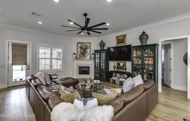 Experience resort style living in this beautifully appointed on Lake Caroline Golf Club in Mississippi - for sale on GolfHomes.com, golf home, golf lot