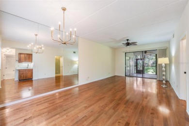 Welcome to this inviting FIRST FLOOR condo in the gated on East Lake Woodlands Country Club in Florida - for sale on GolfHomes.com, golf home, golf lot