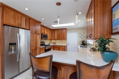 Welcome to a beautifully maintained single-level home nestled on on Mile Square Golf Course in California - for sale on GolfHomes.com, golf home, golf lot