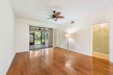 Welcome to this inviting FIRST FLOOR condo in the gated on East Lake Woodlands Country Club in Florida - for sale on GolfHomes.com, golf home, golf lot