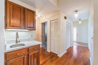 Welcome to this inviting FIRST FLOOR condo in the gated on East Lake Woodlands Country Club in Florida - for sale on GolfHomes.com, golf home, golf lot