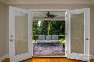 Discover this charming brick home in Revolution Park, minutes on Carolina Golf Club in North Carolina - for sale on GolfHomes.com, golf home, golf lot