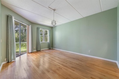 Welcome to this inviting FIRST FLOOR condo in the gated on East Lake Woodlands Country Club in Florida - for sale on GolfHomes.com, golf home, golf lot