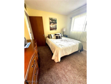 This open and bright 2 bedroom, 2 full bath condo is close to on Lehigh Resort Club in Florida - for sale on GolfHomes.com, golf home, golf lot