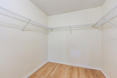 Welcome to this inviting FIRST FLOOR condo in the gated on East Lake Woodlands Country Club in Florida - for sale on GolfHomes.com, golf home, golf lot