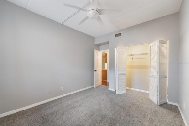 Welcome to this inviting FIRST FLOOR condo in the gated on East Lake Woodlands Country Club in Florida - for sale on GolfHomes.com, golf home, golf lot