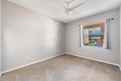 Welcome to this inviting FIRST FLOOR condo in the gated on East Lake Woodlands Country Club in Florida - for sale on GolfHomes.com, golf home, golf lot