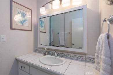 Welcome to a beautifully maintained single-level home nestled on on Mile Square Golf Course in California - for sale on GolfHomes.com, golf home, golf lot