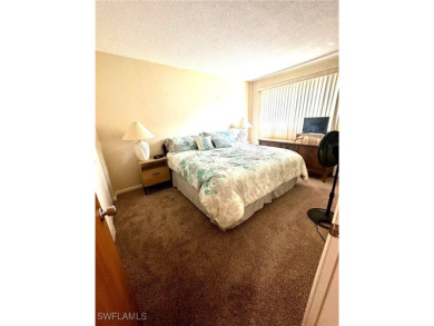 This open and bright 2 bedroom, 2 full bath condo is close to on Lehigh Resort Club in Florida - for sale on GolfHomes.com, golf home, golf lot