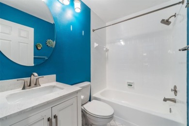 Welcome to this inviting FIRST FLOOR condo in the gated on East Lake Woodlands Country Club in Florida - for sale on GolfHomes.com, golf home, golf lot