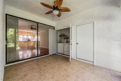 Welcome to this inviting FIRST FLOOR condo in the gated on East Lake Woodlands Country Club in Florida - for sale on GolfHomes.com, golf home, golf lot