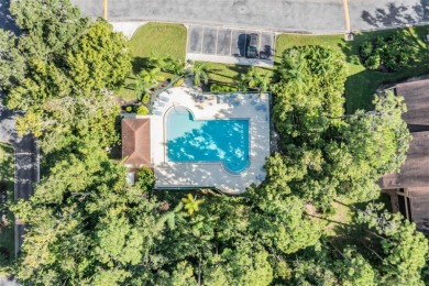 Welcome to this inviting FIRST FLOOR condo in the gated on East Lake Woodlands Country Club in Florida - for sale on GolfHomes.com, golf home, golf lot