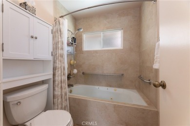 Welcome to a beautifully maintained single-level home nestled on on Mile Square Golf Course in California - for sale on GolfHomes.com, golf home, golf lot