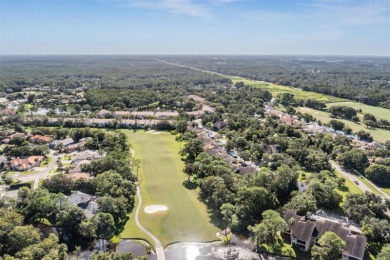 Welcome to this inviting FIRST FLOOR condo in the gated on East Lake Woodlands Country Club in Florida - for sale on GolfHomes.com, golf home, golf lot