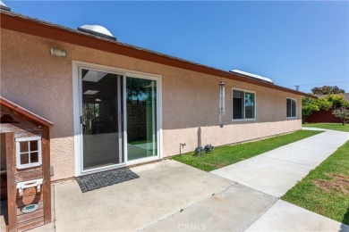 Welcome to a beautifully maintained single-level home nestled on on Mile Square Golf Course in California - for sale on GolfHomes.com, golf home, golf lot