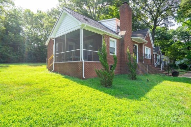 Discover this charming brick home in Revolution Park, minutes on Carolina Golf Club in North Carolina - for sale on GolfHomes.com, golf home, golf lot