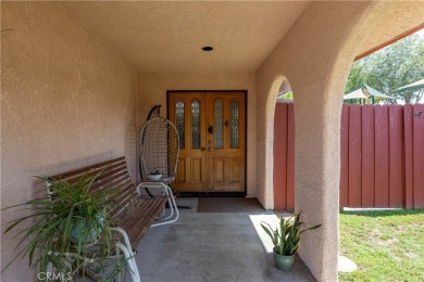 Welcome to a beautifully maintained single-level home nestled on on Mile Square Golf Course in California - for sale on GolfHomes.com, golf home, golf lot