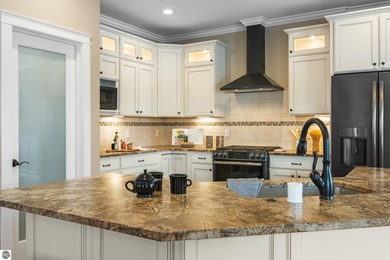 Golf course living o Just off the 11th fairway of The Bear o on Grand Traverse Resort and Spa in Michigan - for sale on GolfHomes.com, golf home, golf lot