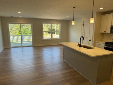 Introducing our Clarkston, two-story townhome. This is an on Fruitport Country Club in Michigan - for sale on GolfHomes.com, golf home, golf lot