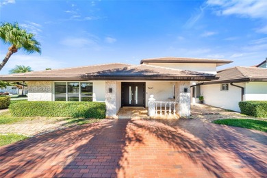 Distinguished luxury estate in South Miami, just 4 minutes from on Briar Bay Golf Course in Florida - for sale on GolfHomes.com, golf home, golf lot