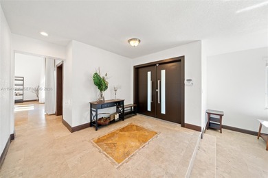 Distinguished luxury estate in South Miami, just 4 minutes from on Briar Bay Golf Course in Florida - for sale on GolfHomes.com, golf home, golf lot