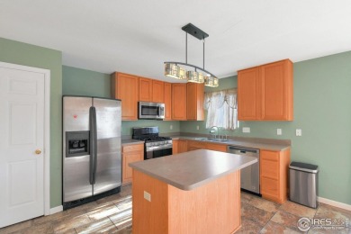 Step inside this bright & spacious 3-bedroom, 2.5-bathroom on Ute Creek Golf Course in Colorado - for sale on GolfHomes.com, golf home, golf lot