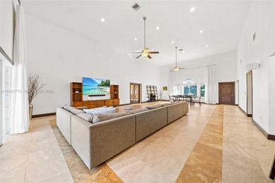 Distinguished luxury estate in South Miami, just 4 minutes from on Briar Bay Golf Course in Florida - for sale on GolfHomes.com, golf home, golf lot