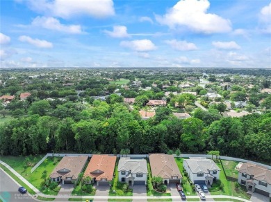 Beautifully upgraded pool home on the golf course. Boasting 4 on Woodmont Country Club in Florida - for sale on GolfHomes.com, golf home, golf lot