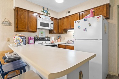 Welcome to your new coastal escape--just a breezy golf cart ride on Beachwood Golf Club in South Carolina - for sale on GolfHomes.com, golf home, golf lot