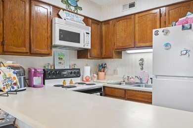 Welcome to your new coastal escape--just a breezy golf cart ride on Beachwood Golf Club in South Carolina - for sale on GolfHomes.com, golf home, golf lot