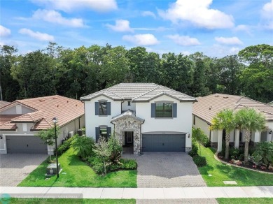 Beautifully upgraded pool home on the golf course. Boasting 4 on Woodmont Country Club in Florida - for sale on GolfHomes.com, golf home, golf lot