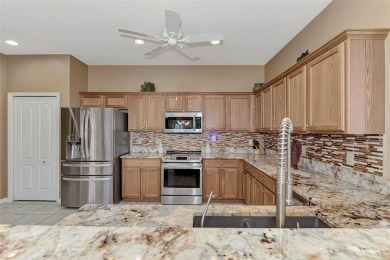HERON CREEK VILLA ON THE LAKE! Welcome to your dream retreat in on Heron Creek Golf and Country Club in Florida - for sale on GolfHomes.com, golf home, golf lot