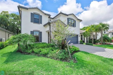 Beautifully upgraded pool home on the golf course. Boasting 4 on Woodmont Country Club in Florida - for sale on GolfHomes.com, golf home, golf lot