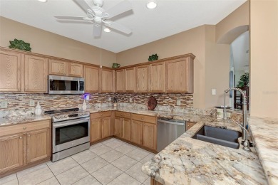 HERON CREEK VILLA ON THE LAKE! Welcome to your dream retreat in on Heron Creek Golf and Country Club in Florida - for sale on GolfHomes.com, golf home, golf lot